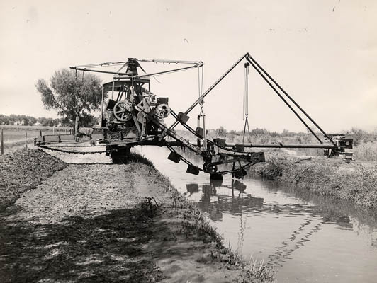 A large mechnical contraption knows as a dredger.